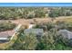 Aerial view of house and surrounding neighborhood at 151 Pine St, Babson Park, FL 33827