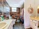 Clean bathroom with shower and wood-like walls at 151 Pine St, Babson Park, FL 33827