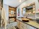 Bathroom with large mirror, stone-like sink, and walk-in shower at 151 Pine St, Babson Park, FL 33827