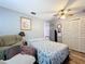 Relaxing bedroom with a double bed and recliner at 151 Pine St, Babson Park, FL 33827