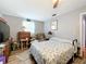 Comfortable bedroom with a double bed and dresser at 151 Pine St, Babson Park, FL 33827