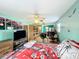 Serene bedroom with Japanese decor and a workspace at 151 Pine St, Babson Park, FL 33827