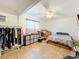 Main bedroom with a double bed and tiled floors at 151 Pine St, Babson Park, FL 33827