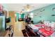 Large bedroom with a sitting area and gaming setup at 151 Pine St, Babson Park, FL 33827