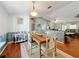 Rustic farmhouse dining room with a large wooden table at 151 Pine St, Babson Park, FL 33827