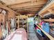 Long garage with shelving and storage space at 151 Pine St, Babson Park, FL 33827