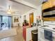 Efficient kitchen features white appliances and wood cabinets at 151 Pine St, Babson Park, FL 33827