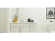 Clean bathroom with white vanity, single sink, and modern decor at 1299 Inkberry Cir, Deland, FL 32720