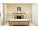 Stylish bedroom with a rattan bed frame and neutral tones at 1299 Inkberry Cir, Deland, FL 32720