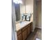 Clean bathroom with vanity, sink, and tiled floor at 384 Arbella Loop, The Villages, FL 32162