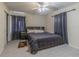 Main bedroom with king-size bed and ceiling fan at 1039 W 12Th St, Lakeland, FL 33805