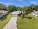 House with a two-car garage and large yard at 2739 Everleth Dr, Lakeland, FL 33810