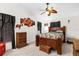 Primary bedroom with ceiling fan and ample closet space at 2739 Everleth Dr, Lakeland, FL 33810