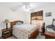 Bright bedroom with a double bed, nightstand, and ceiling fan at 2739 Everleth Dr, Lakeland, FL 33810