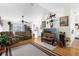 Open living area with hardwood floors, high ceilings, and built-ins at 2739 Everleth Dr, Lakeland, FL 33810