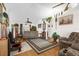 Living room with hardwood floors, two recliners and built in shelving at 2739 Everleth Dr, Lakeland, FL 33810