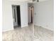 Bedroom with new flooring and a ceiling fan at 333 Lake Howard Nw Dr # 204C, Winter Haven, FL 33880