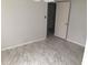 Clean hallway with tile floors at 333 Lake Howard Nw Dr # 204C, Winter Haven, FL 33880