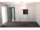 Bright dining area with modern light fixture at 333 Lake Howard Nw Dr # 204C, Winter Haven, FL 33880