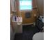 Clean bathroom with a toilet, sink, and shower at 11390 E Irlo Bronson Memorial Hwy, St Cloud, FL 34773
