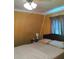 Bedroom with a double bed, nightstand and ceiling fan at 11390 E Irlo Bronson Memorial Hwy, St Cloud, FL 34773