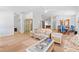 Open living and dining area with light wood floors and abundant natural light at 1967 Long Boat Dr, Lakeland, FL 33810