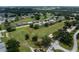 Aerial view showcasing the community and golf course at 1967 Long Boat Dr, Lakeland, FL 33810