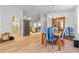 Dining area with a wooden table and blue patterned chairs at 1967 Long Boat Dr, Lakeland, FL 33810