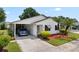 Single story home with carport and palm trees at 1967 Long Boat Dr, Lakeland, FL 33810