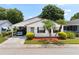 White single story home with carport and landscaping at 1967 Long Boat Dr, Lakeland, FL 33810