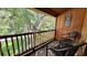 Private balcony offering tranquil views of the surrounding landscape at 3200 River Ranch Blvd # 204, River Ranch, FL 33867