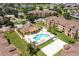 Community pool, volleyball court, and clubhouse at 612 Terrace Ridge Cir # 612, Davenport, FL 33896