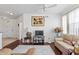 Spacious living room with hardwood floors, ceiling fan, and large windows at 612 Terrace Ridge Cir # 612, Davenport, FL 33896
