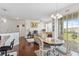 Bright dining area with hardwood floors and access to balcony at 612 Terrace Ridge Cir # 612, Davenport, FL 33896