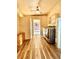 Laundry room with washer, dryer, and access to patio at 250 W New York Ave, Orange City, FL 32763