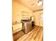 Laundry room with washer, dryer, and utility sink at 250 W New York Ave, Orange City, FL 32763