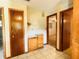 Hallway with built-in storage and access to bedrooms at 250 W New York Ave, Orange City, FL 32763