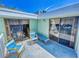 Private balcony with patio furniture at 4150 S Atlantic Ave # 107C, New Smyrna Beach, FL 32169