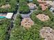 Overhead view of complex, highlighting building rooftops and pool at 4150 S Atlantic Ave # 107C, New Smyrna Beach, FL 32169