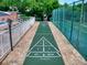 Clean shuffleboard court next to pool and tennis at 4150 S Atlantic Ave # 107C, New Smyrna Beach, FL 32169