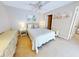 Bedroom with a queen bed and coastal decor at 4150 S Atlantic Ave # 107C, New Smyrna Beach, FL 32169