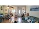 Open concept living area with kitchen, dining, and living spaces at 9 Villa Villar Ct, Deland, FL 32724