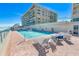 Inviting pool area with lounge chairs at 4575 S Atlantic Ave # 6307, Ponce Inlet, FL 32127