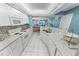 Updated kitchen with white cabinets, granite, ocean view at 4575 S Atlantic Ave # 6307, Ponce Inlet, FL 32127