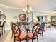 Elegant dining area with glass table and seating at 2403 S Atlantic Ave # 409, Daytona Beach Shores, FL 32118