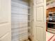 Walk-in pantry with wire shelving; great for storage at 2403 S Atlantic Ave # 409, Daytona Beach Shores, FL 32118