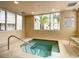 Indoor community spa with bench seating at 2403 S Atlantic Ave # 409, Daytona Beach Shores, FL 32118