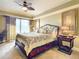 Spacious main bedroom with water views and king-size bed at 2403 S Atlantic Ave # 409, Daytona Beach Shores, FL 32118