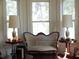 Living room with antique furniture and bay window at 207 E 2Nd Ave, Pierson, FL 32180