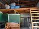 Spacious workshop with loft storage and plenty of room for tools and equipment at 207 E 2Nd Ave, Pierson, FL 32180